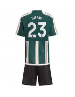 Manchester United Luke Shaw #23 Venkovní dres pro děti 2023-24 Krátký Rukáv (+ trenýrky)